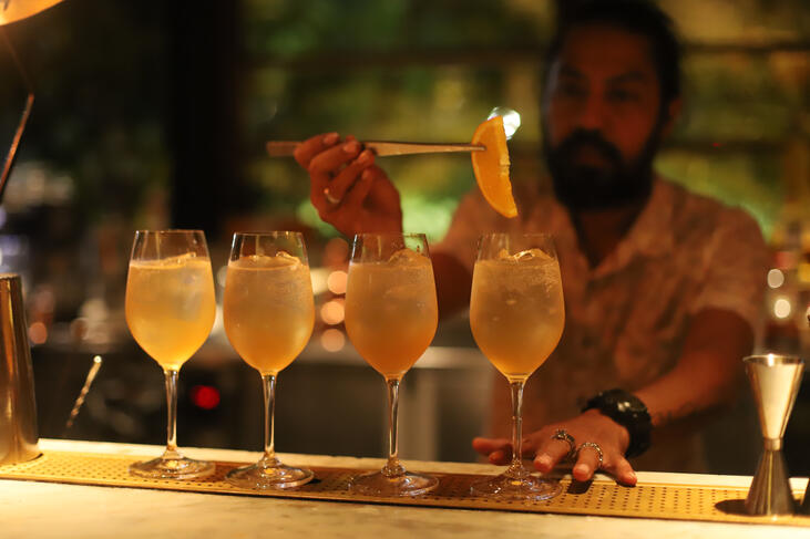 Our brand ambassador, Pius Ebang, in action, making delicious Palapa Spritzes